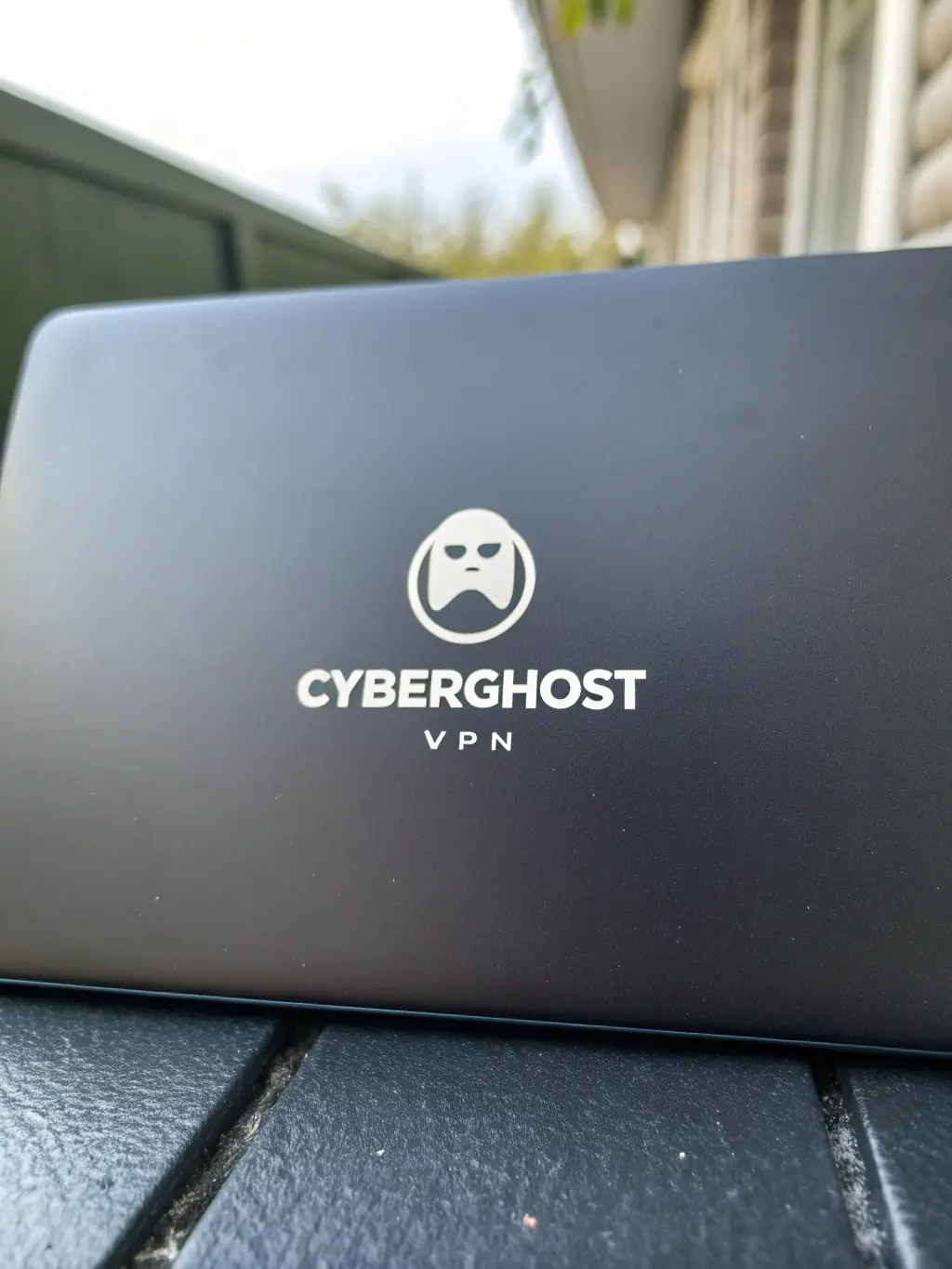 A professional-looking screenshot of CyberGhost VPN's interface, showcasing its dedicated servers for streaming and torrenting, set against a background of data streams.